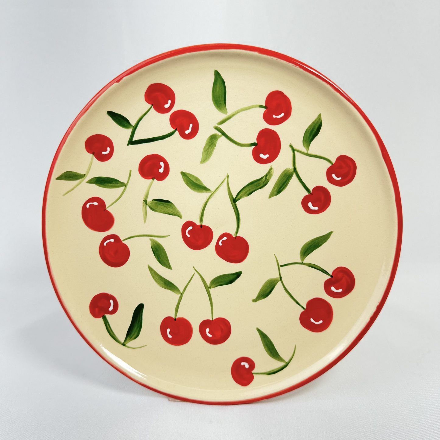Plato plano de cerezas