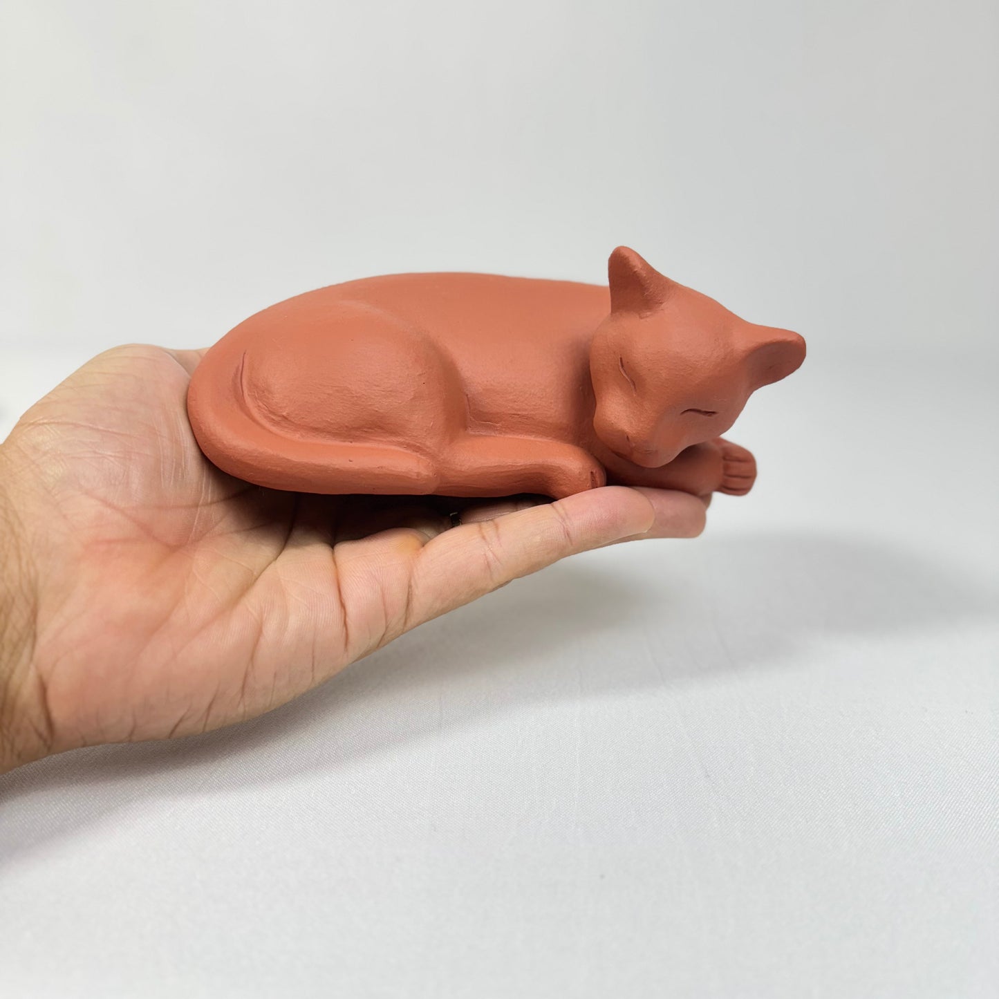 Escultura de un pequeño felino