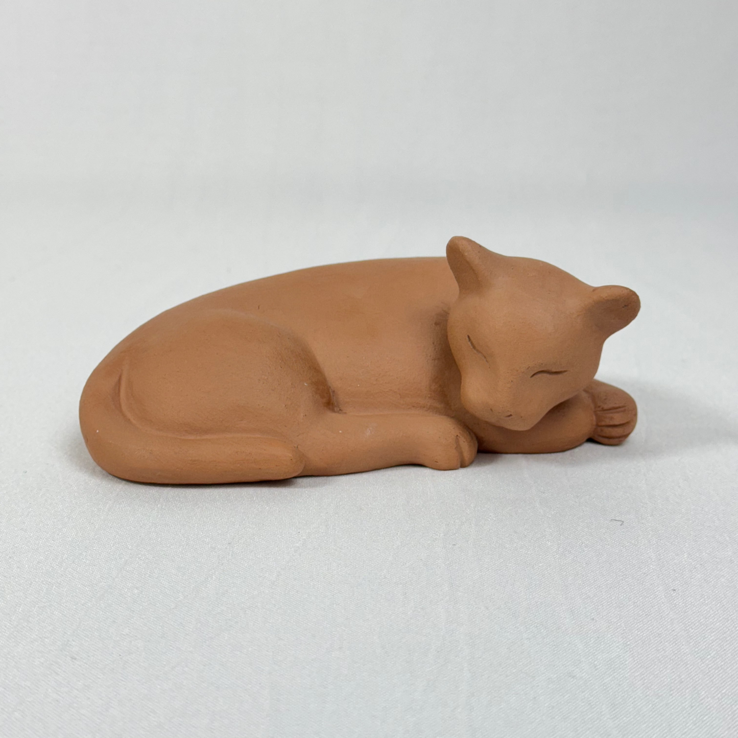 Escultura de un pequeño felino