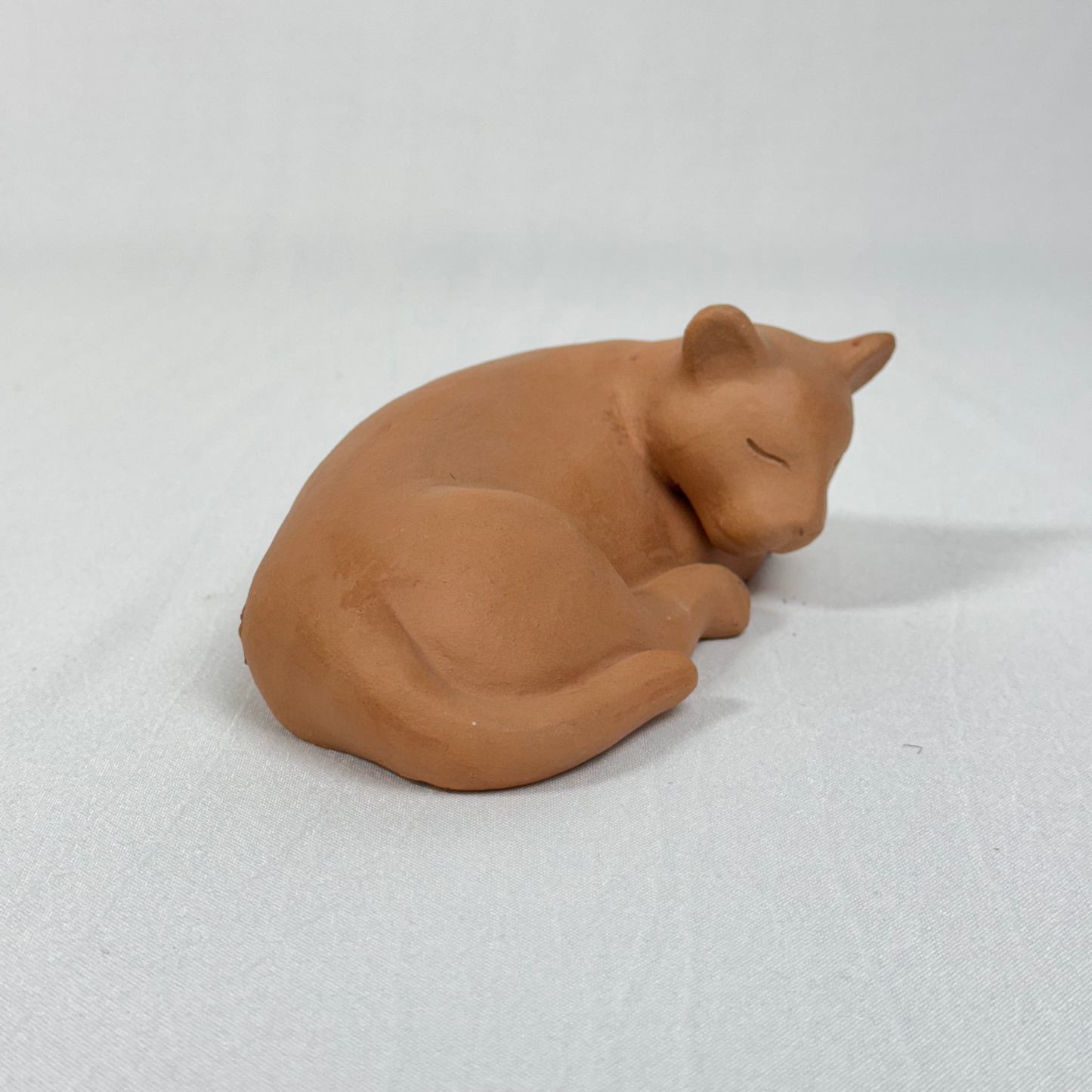 Escultura de un pequeño felino