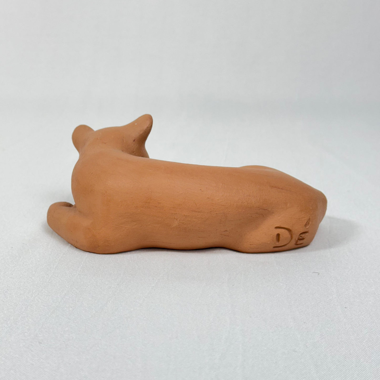 Escultura de un pequeño felino