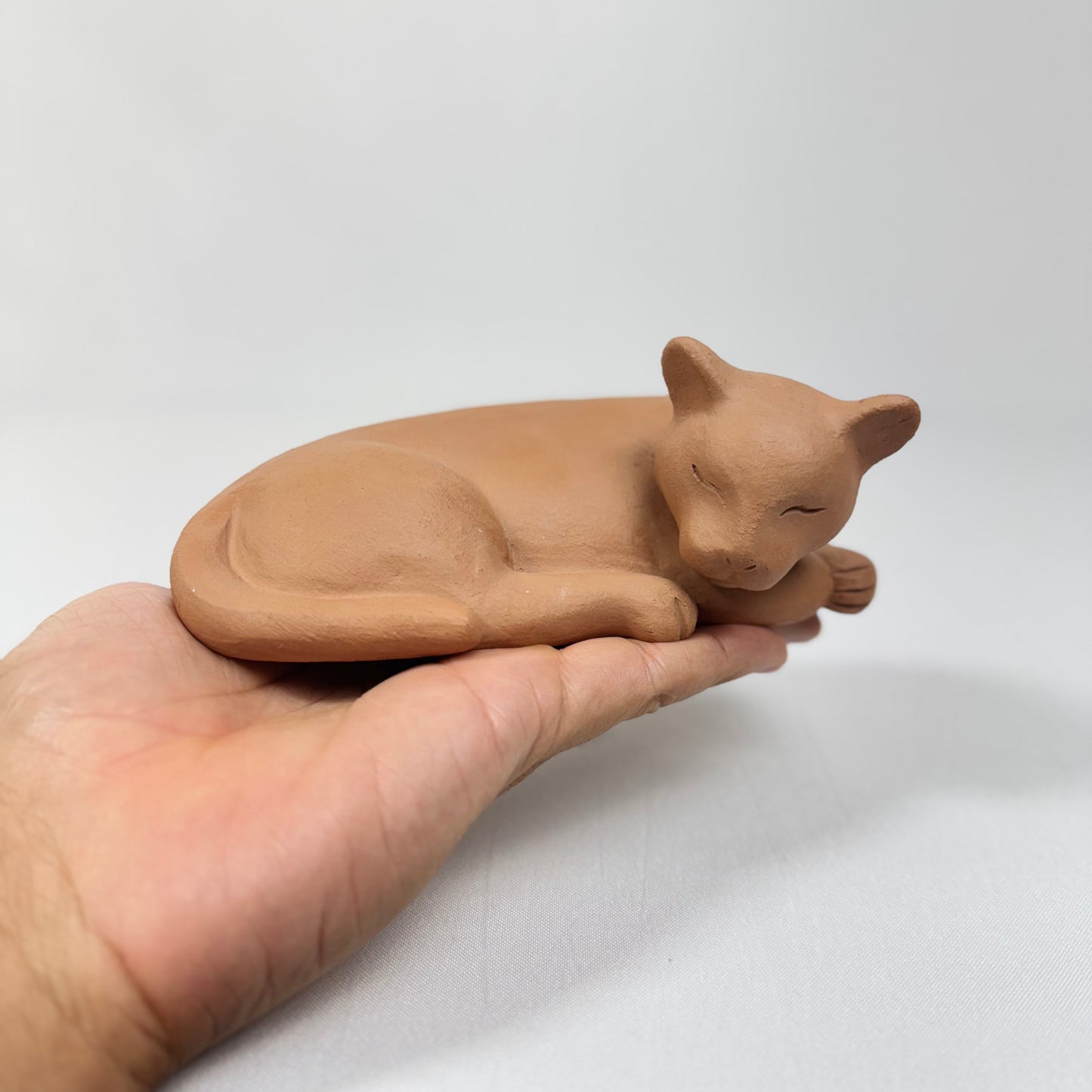Escultura de un pequeño felino