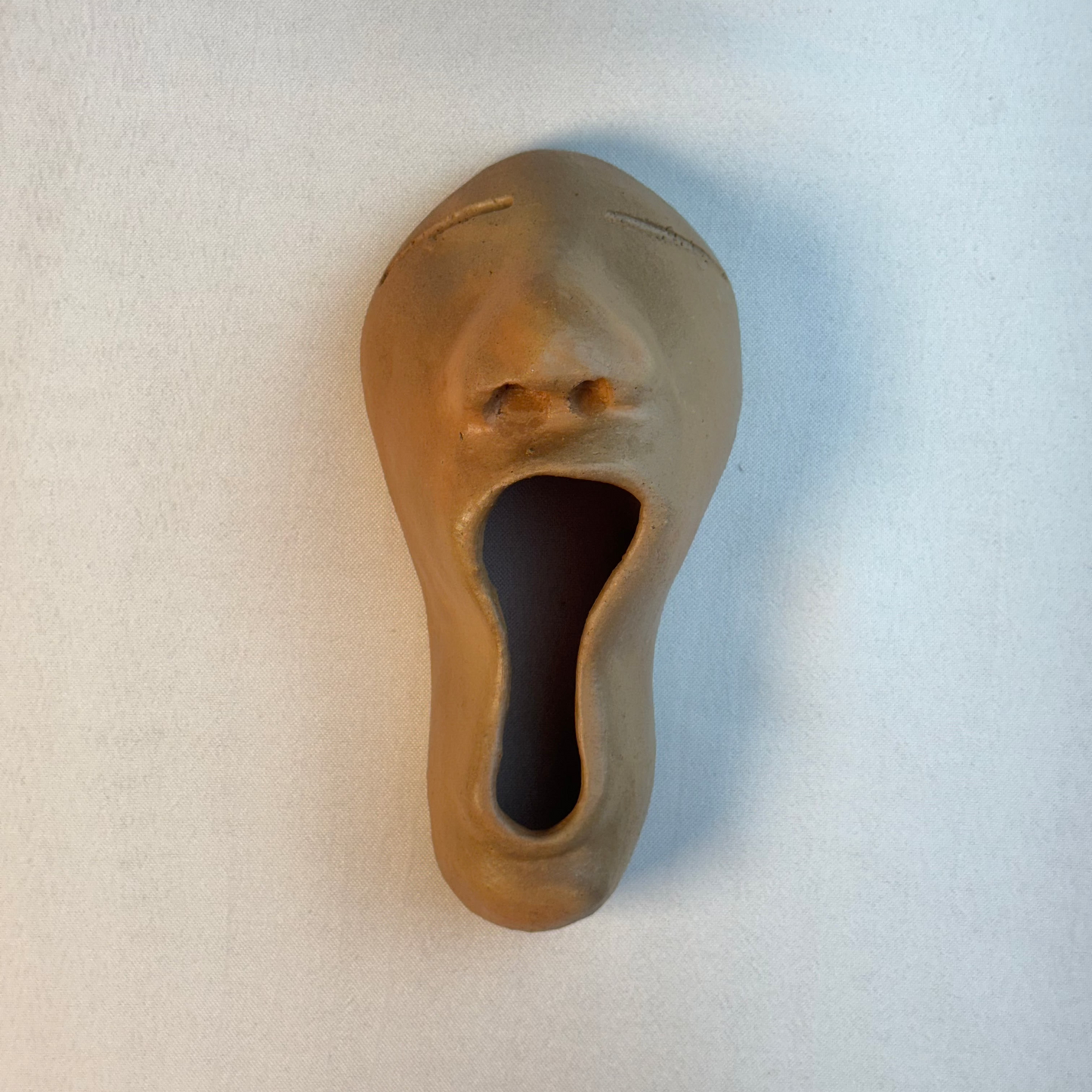 Escultura del bostezo